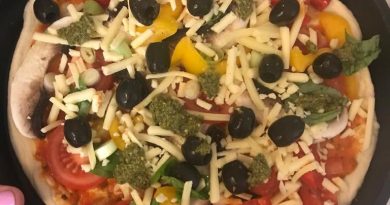 Pizza with olives and peppers