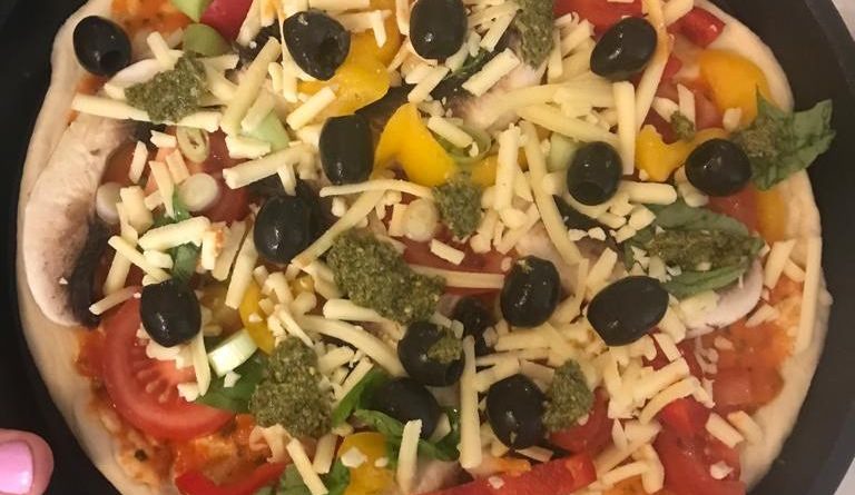 Pizza with olives and peppers