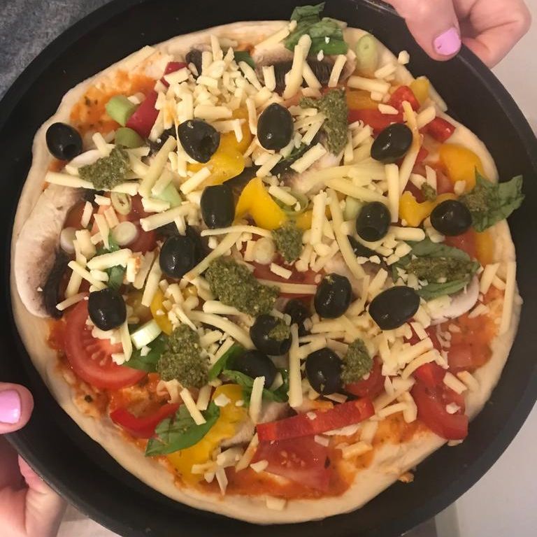 Pizza with olives and peppers