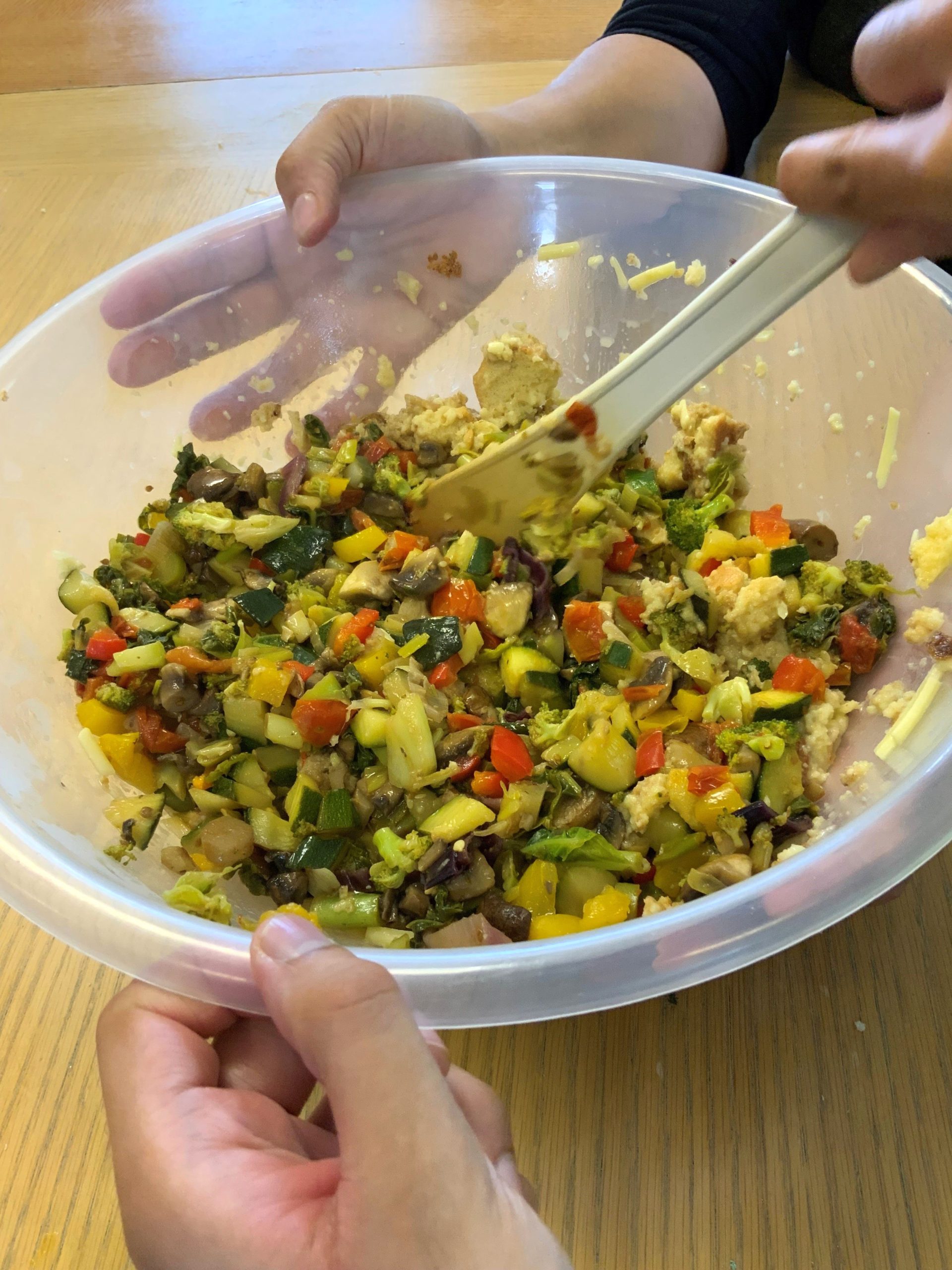 A bowl with finely-chopped salad