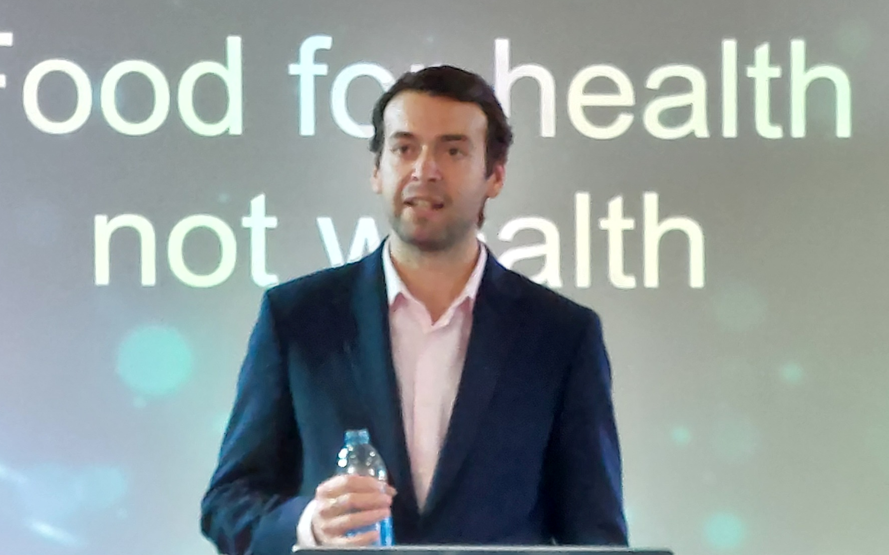 Andrew Forsey speaks from the front at the Food for Health not Wealth conference