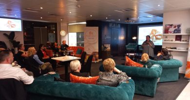 The audience sitting on sofas at the launch of FoodSavers in Leeds