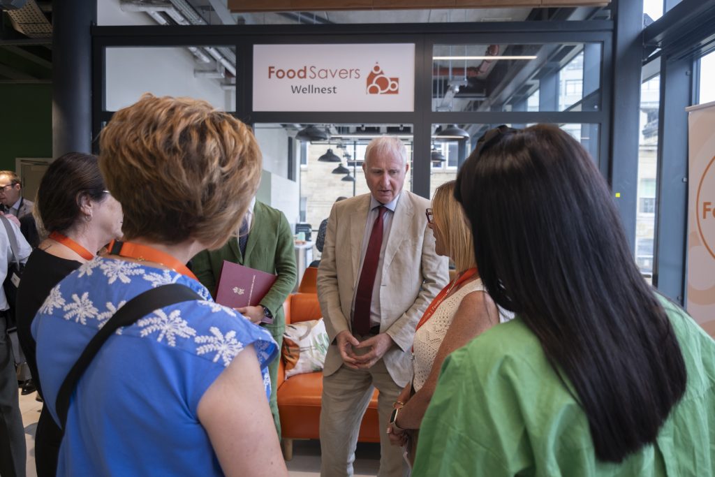 Daniel Zeichner talks with members of the FoodSavers team