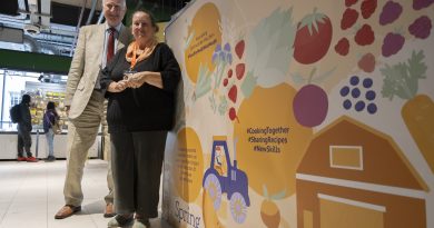 Minister of State for Food Security and Rural Affairs, Daniel Zeichner, with Inn Churches' CEO, Juli Thompson, in front of the FoodSavers Cookery School